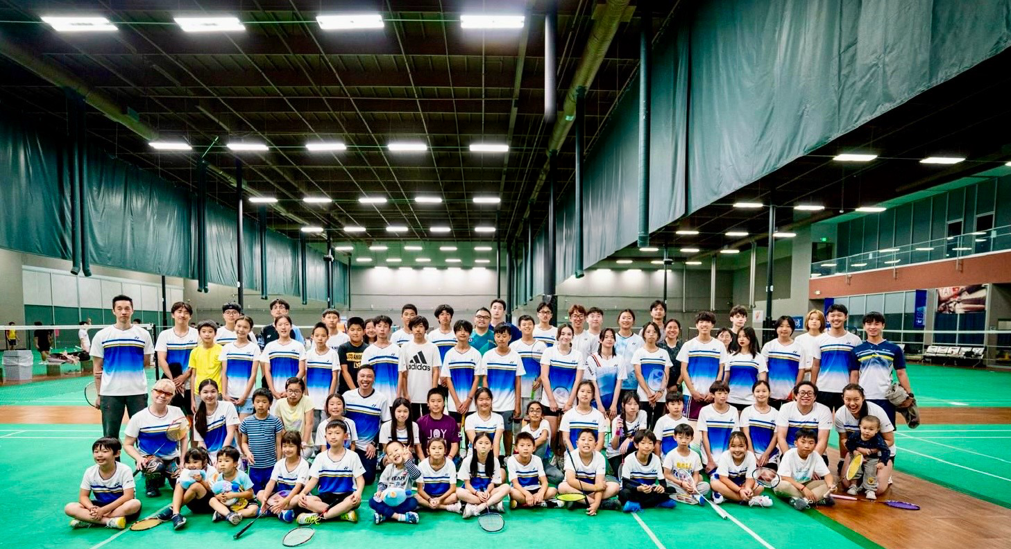 Quest Badminton students and coaches on the courts